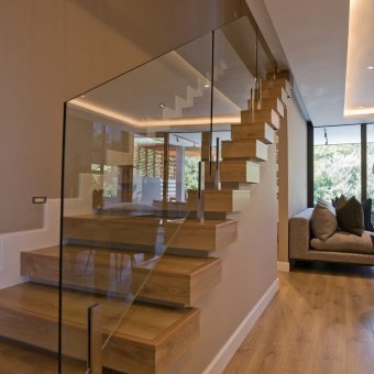 Beautiful laminate herringbone installation throughout a Home in Zimbali.